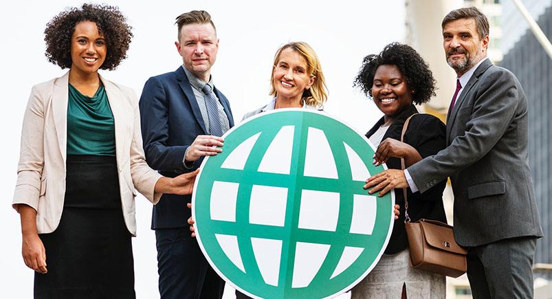 Employees holding an icon sign