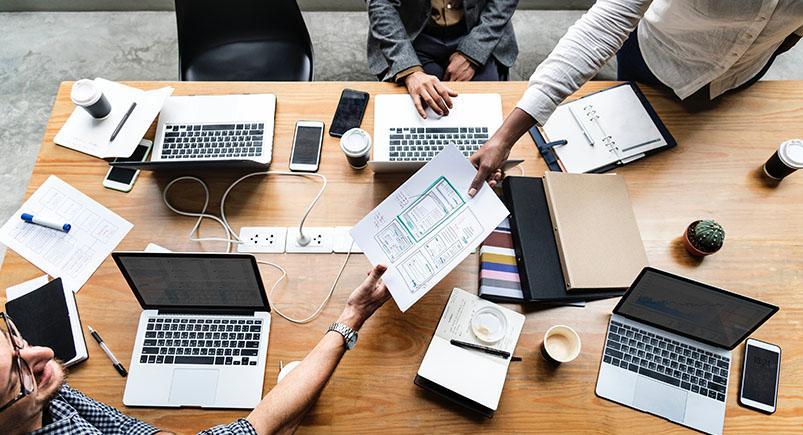 Employees working together on a project