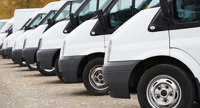 A fleet of luxury delivery vans