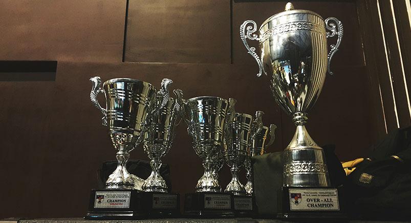the-2015-fleet-truck-of-the-year_awards-tophies_ariel-besagar A shelf with trophies on it