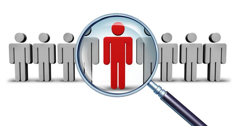 Job search and career choice employment concept with human icons and a red businessman character in a magnifying glass as a symbol of recruitment and occupation