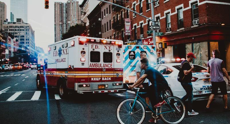 Ambulance turning down a street