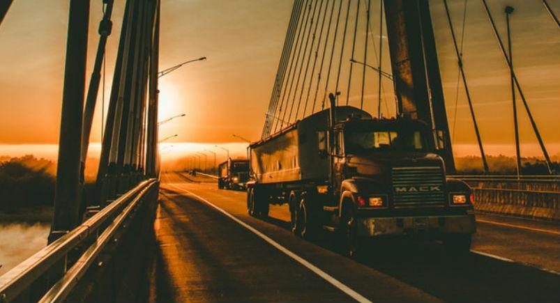 Truck driving on a bridge