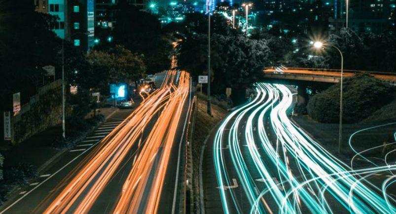 Cars traveling at high speeds on the freeway