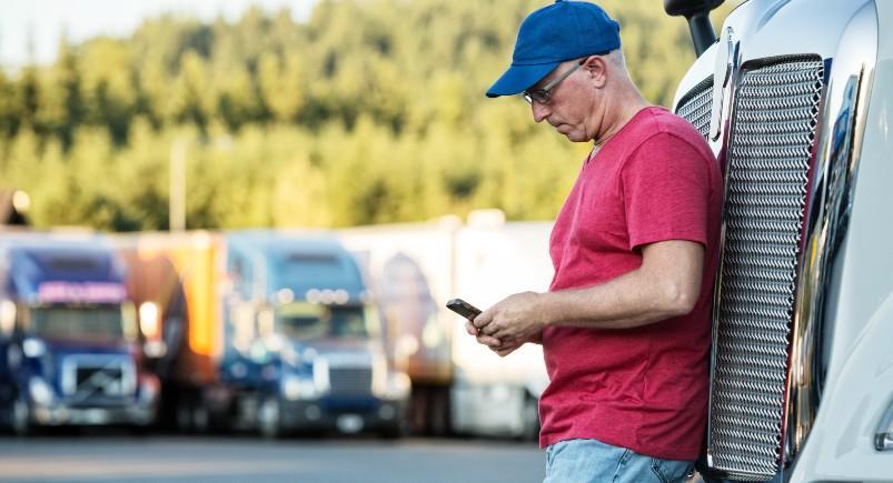 Truck driver using TeamWherx to log hours in its accurate Timekeeping solution.