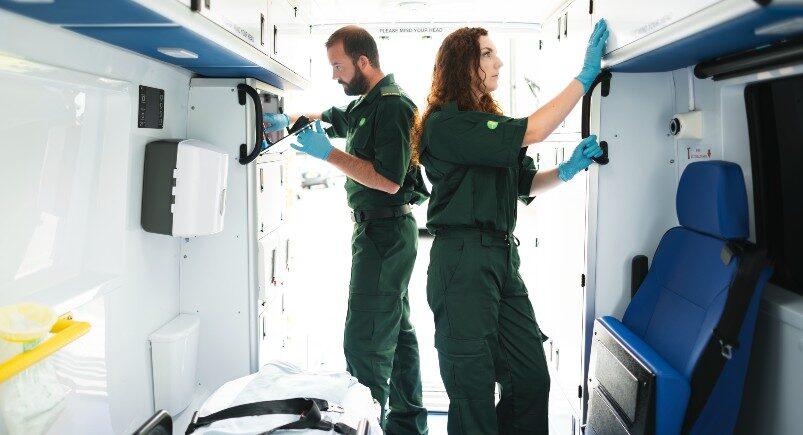 Healthcare employees checking vehicle