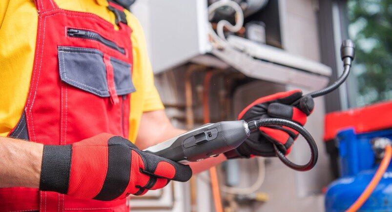 An HVAC industry technician working in the field