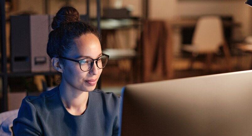 An office employee working at a desktop