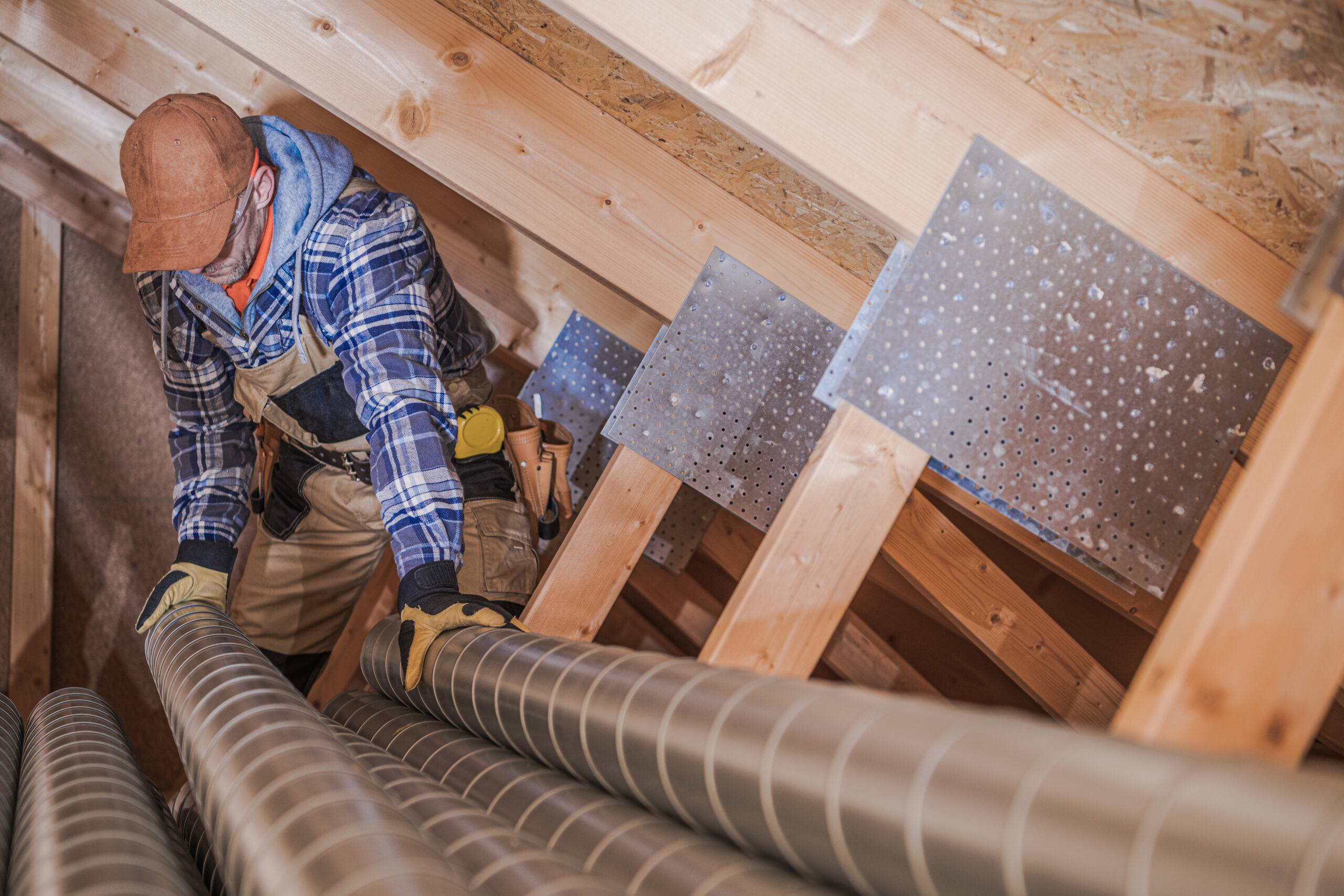 HVAC Technician Assembling Air Vent In House.